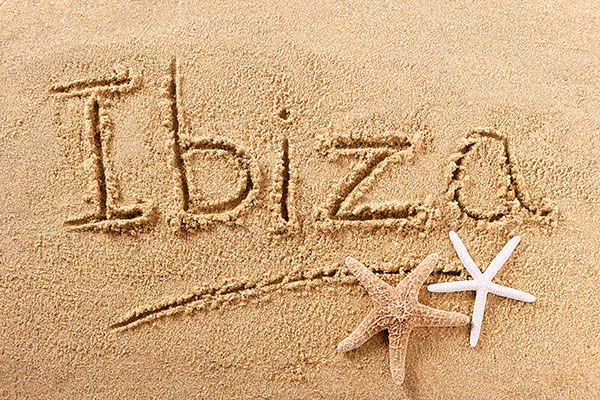 ibiza-spain-beach-sand-sign